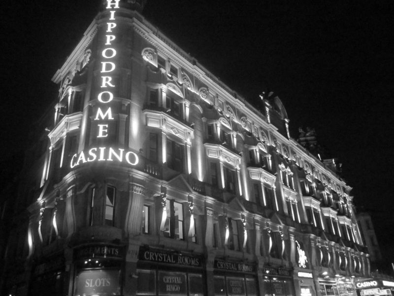 The Hippodrome Casino lit up at night on the edge of Leicester Square, London